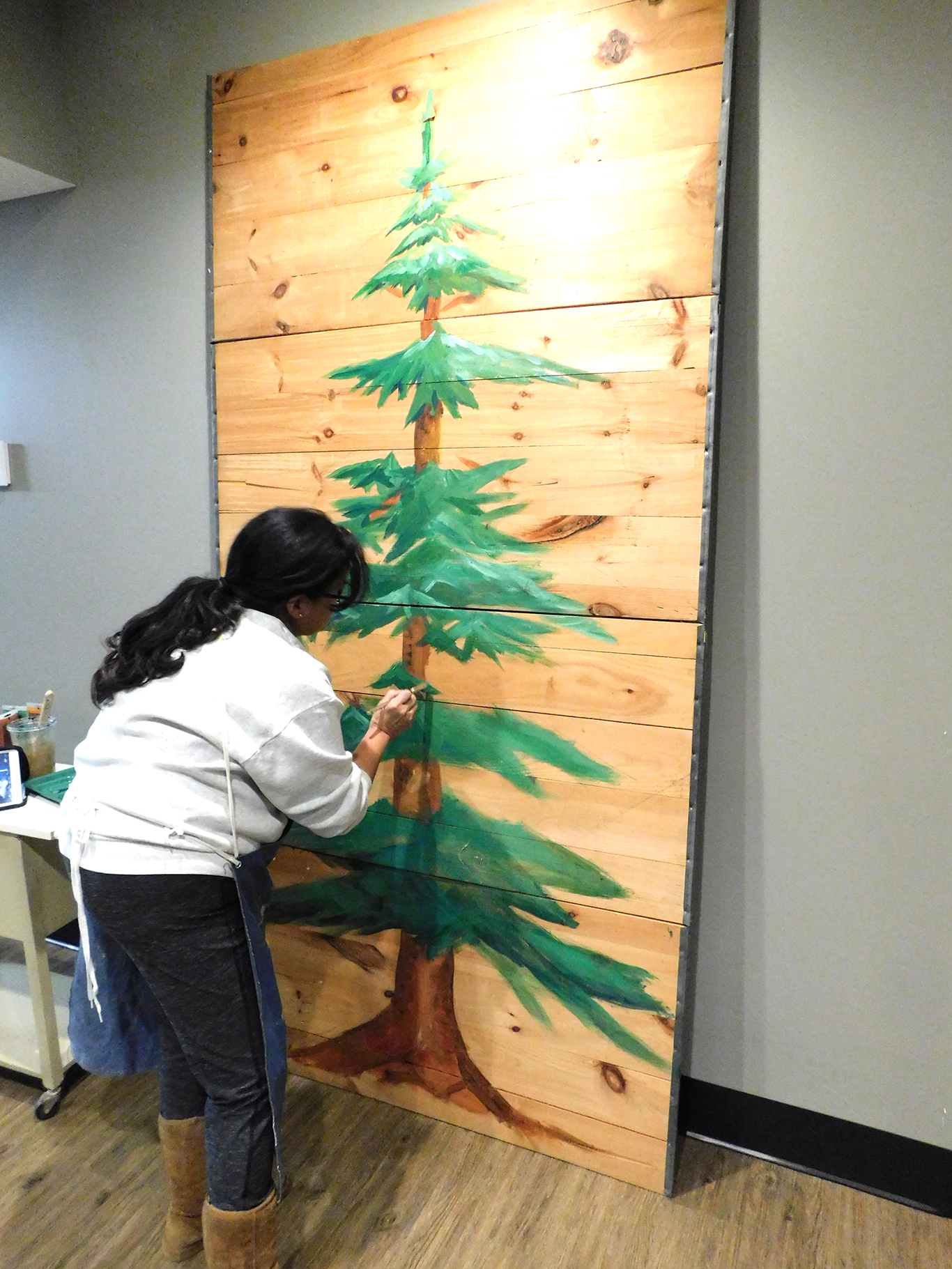 Mrs. Zeigler Painting our Christmas Tree